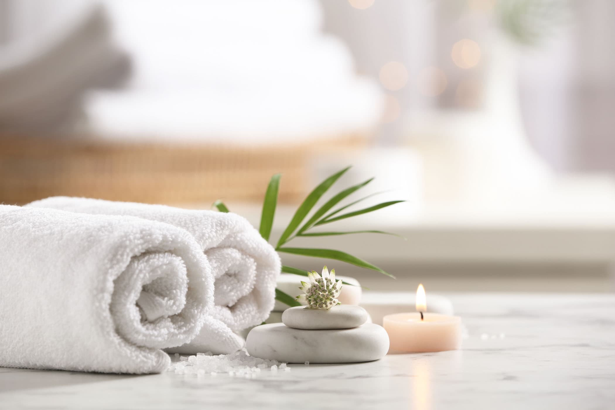Beautiful Composition With Spa Stones On White Marble Table