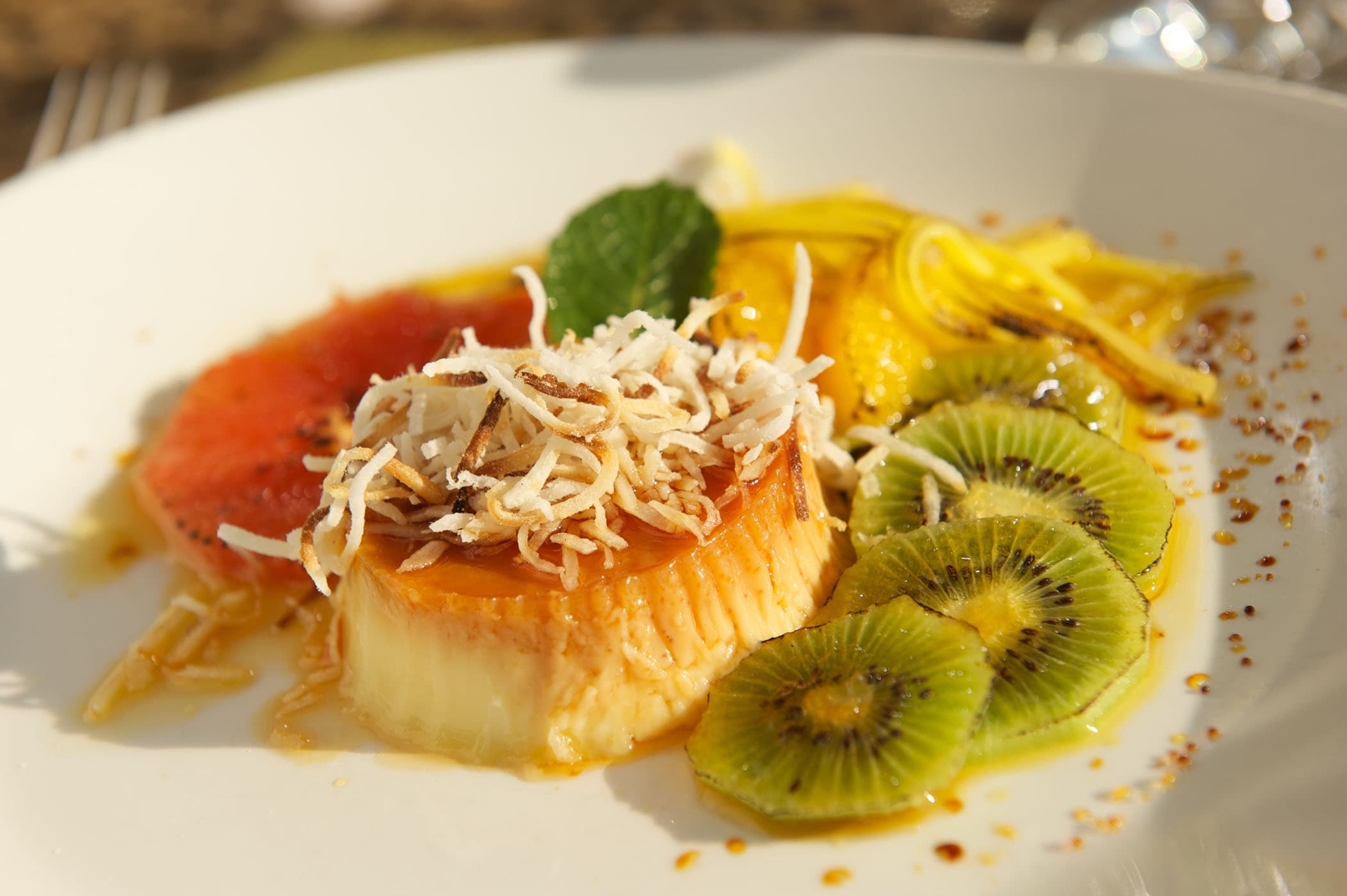 Creme Brulee with fresh kiwi, mango and other fruits