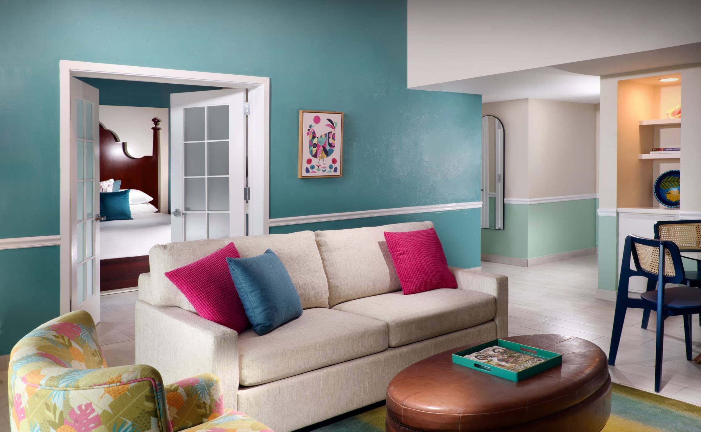 The living room, dining area and kitchen in an open concept 1 bedroom suite at Ocean Key