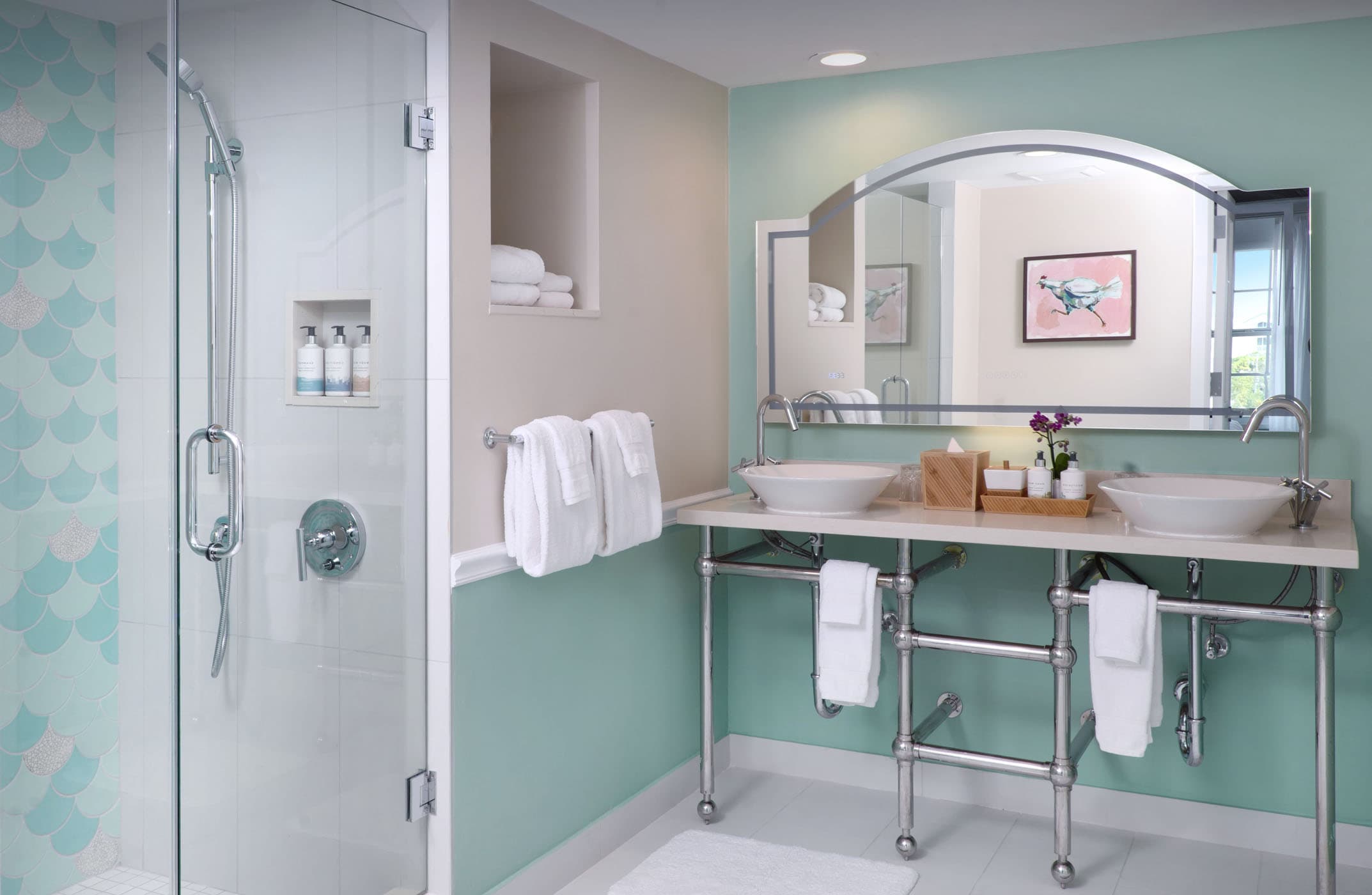 A double sink vanity and shower in 1 bedroom Suite at Ocean Key