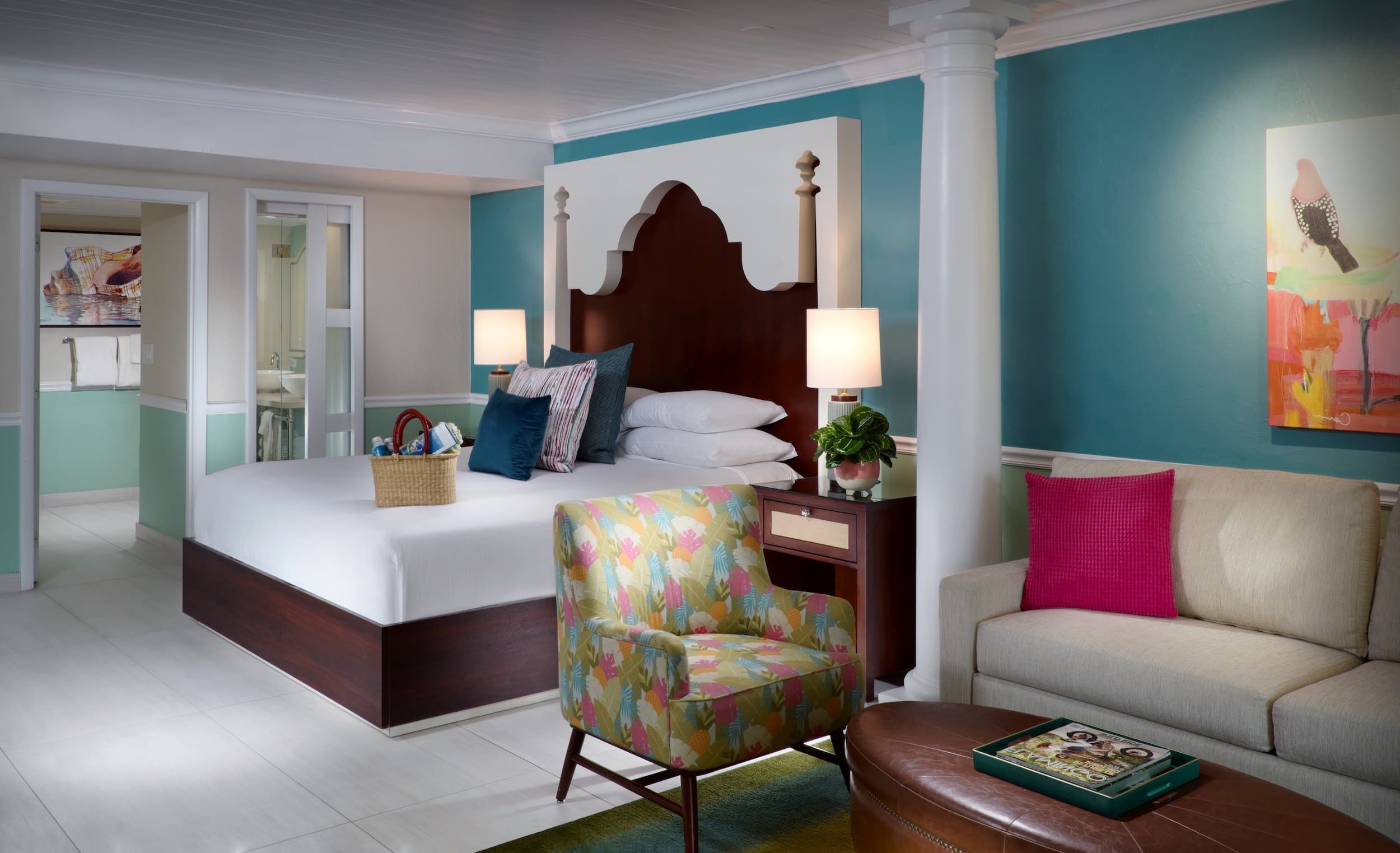 A junior Suite room with a large bed and living space