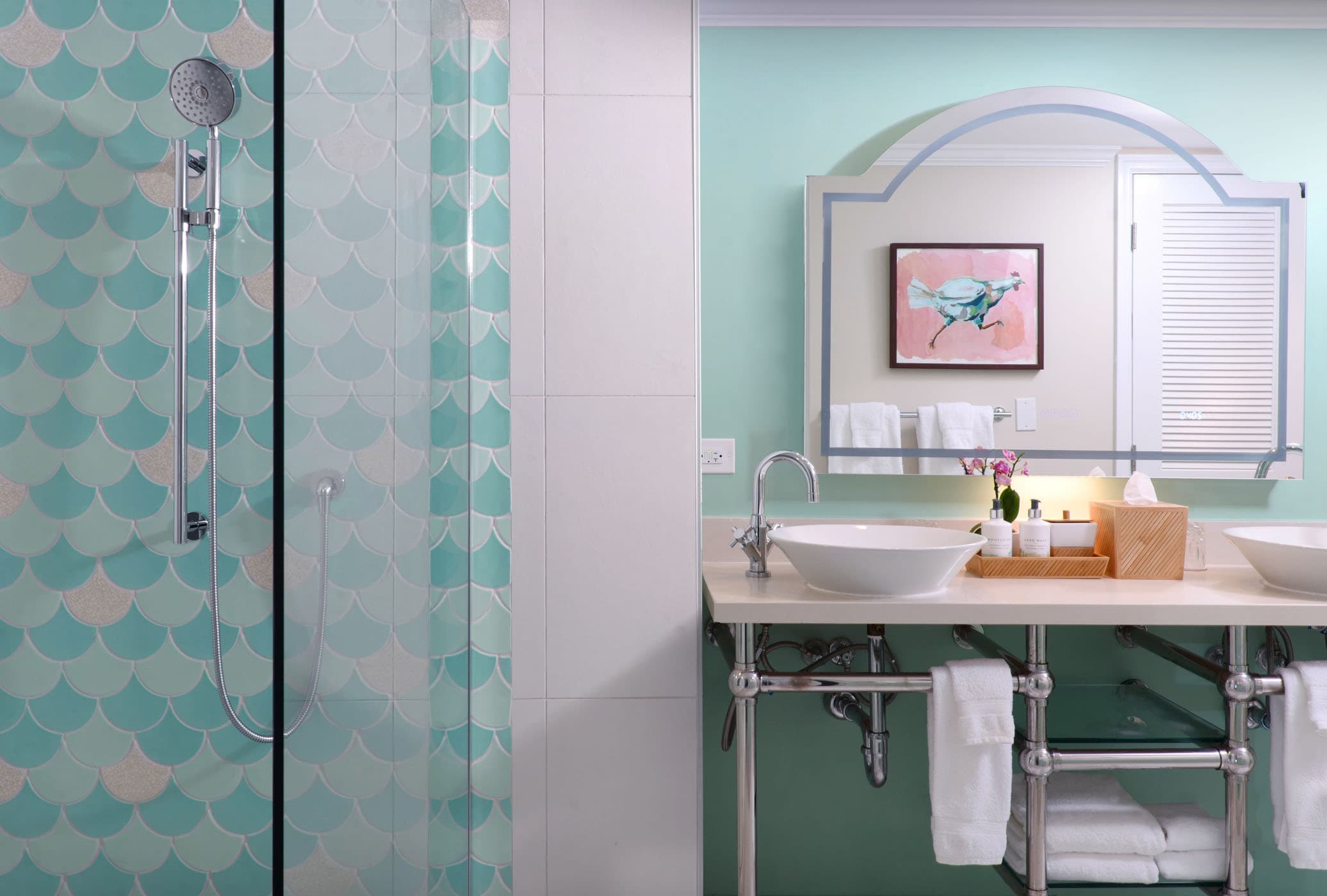 A double sink vanity and shower in a Junior Suite at Ocean Key