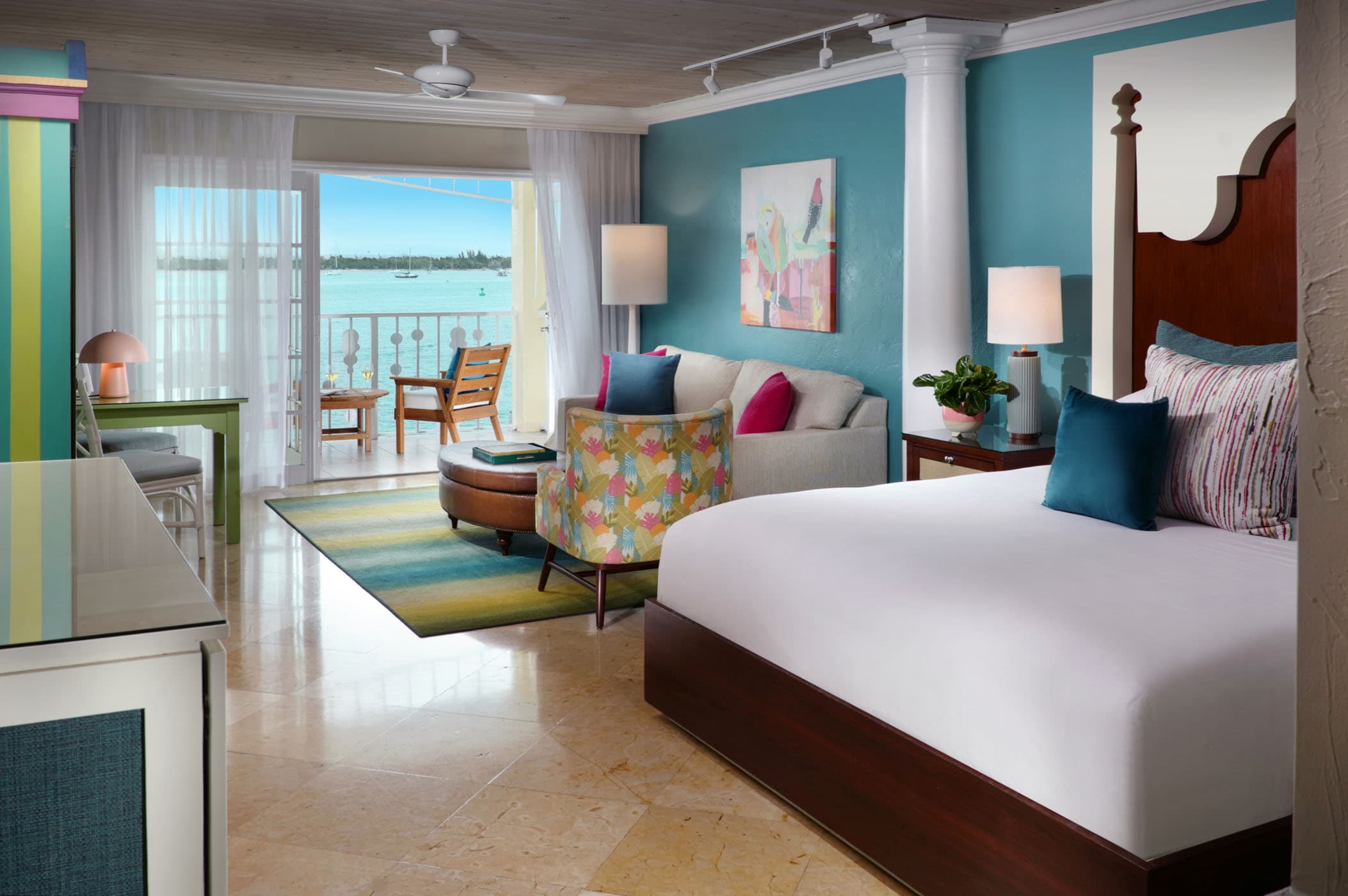 The bedroom, living room, and balcony in a Boutique Suite at Ocean Key