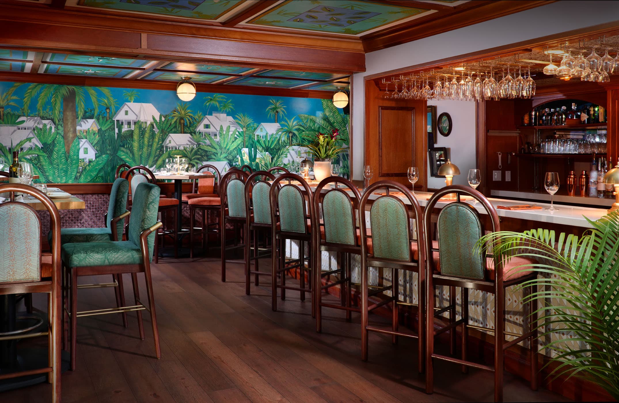 Hot Tin Roof dinning bar lined with chairs ready for service