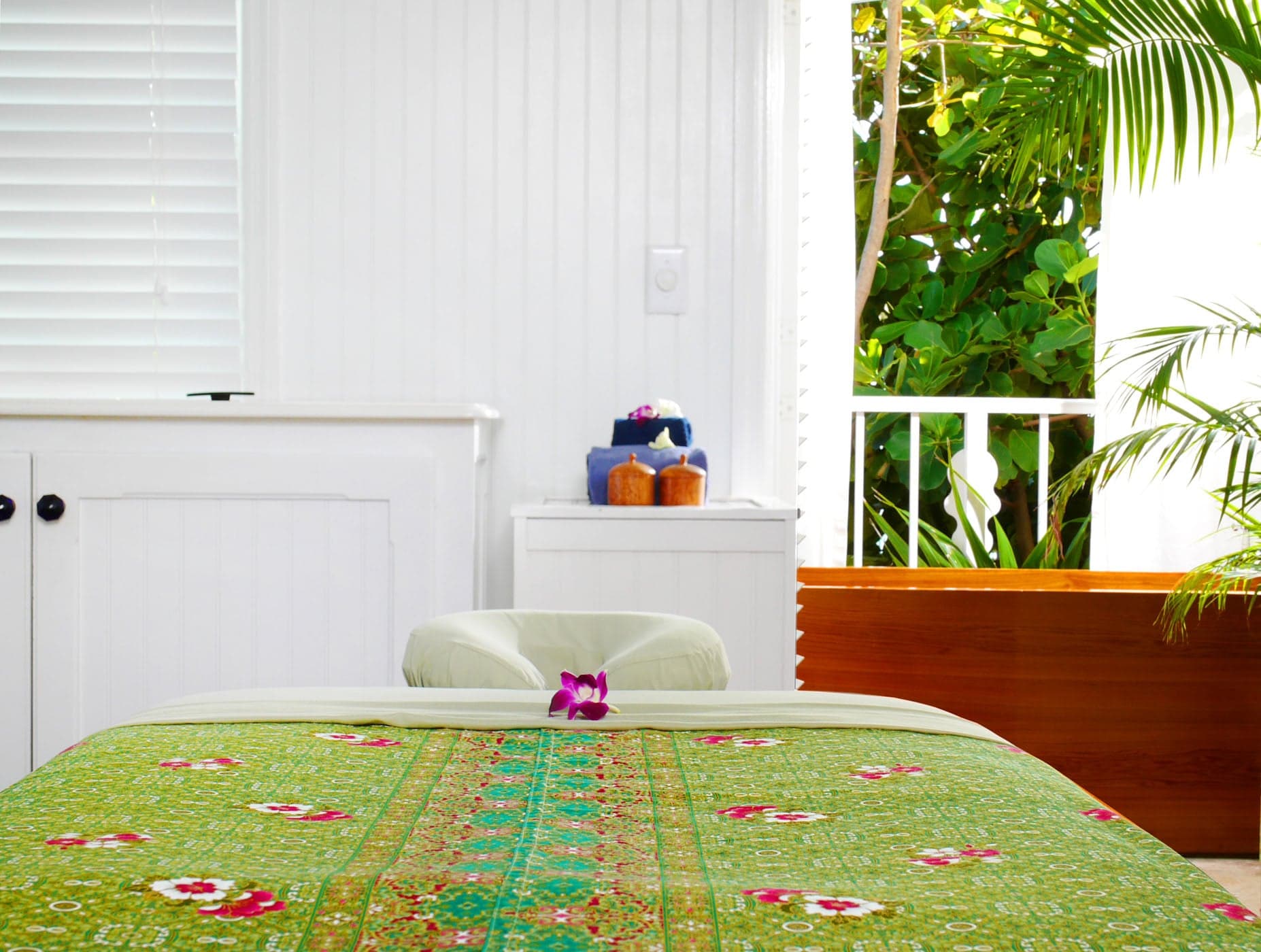 A bed set up for a massage at the spa