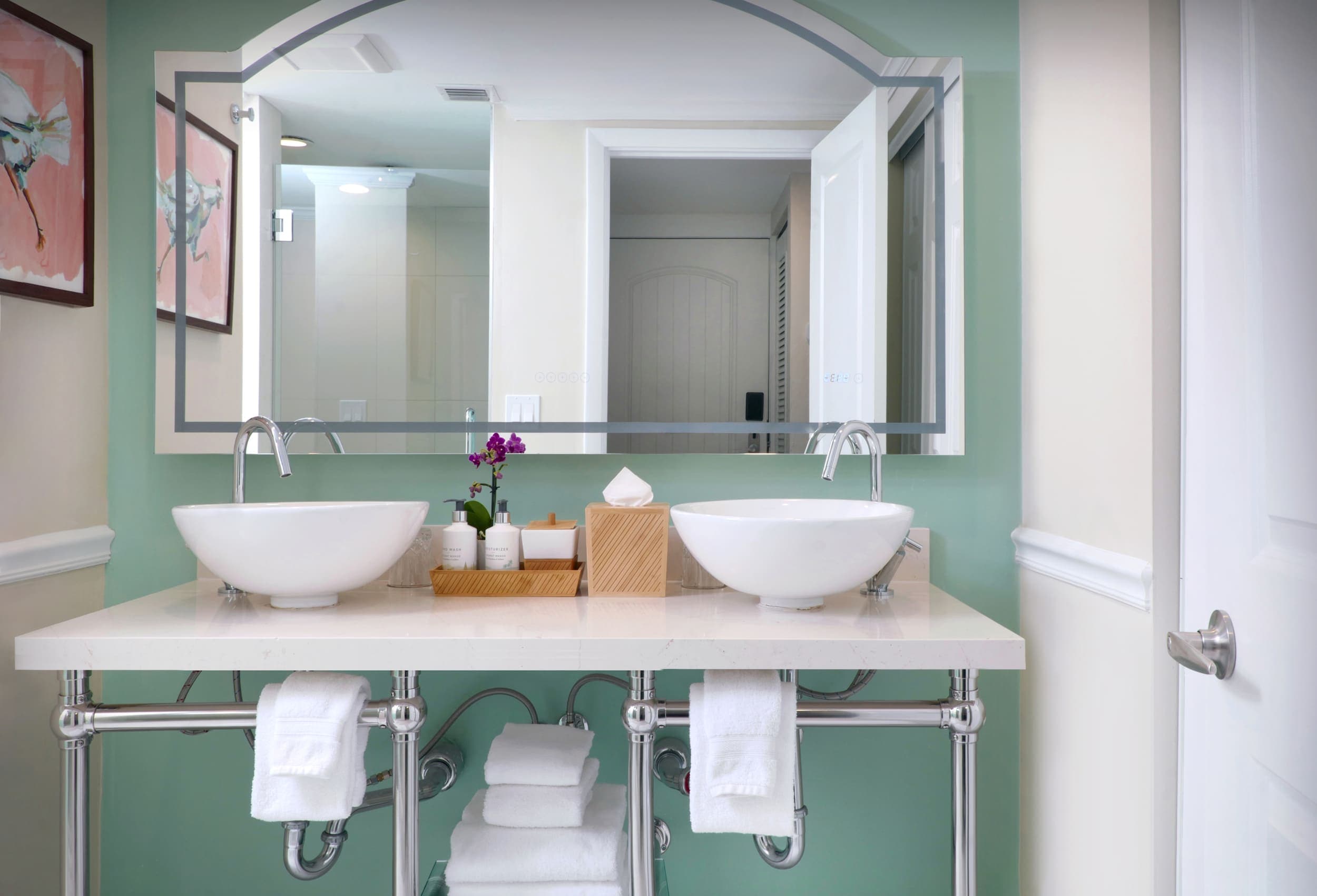 Standard guestroom bathroom with double sink vanity at Ocean Key Resort & Spa