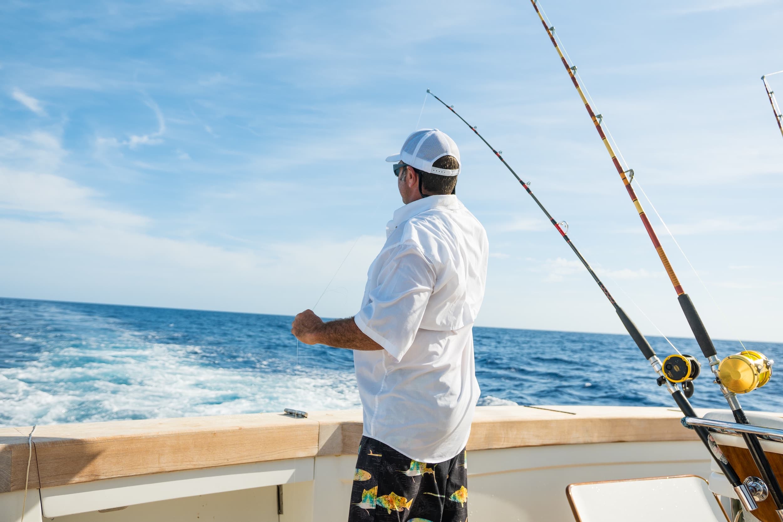 A man offshore fishing
