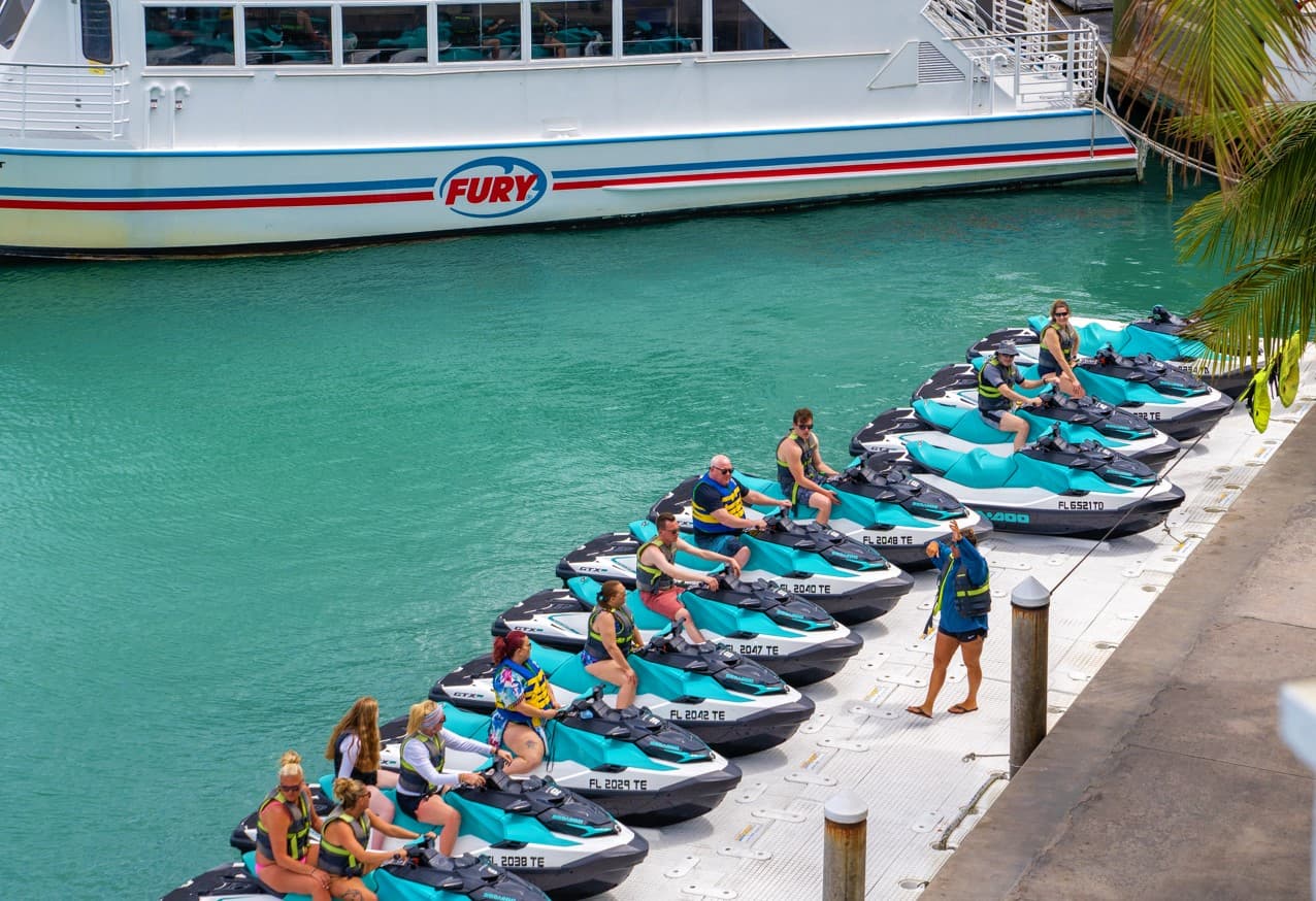 People getting a lesson on how to Jet ski with Alverez Jest Ski