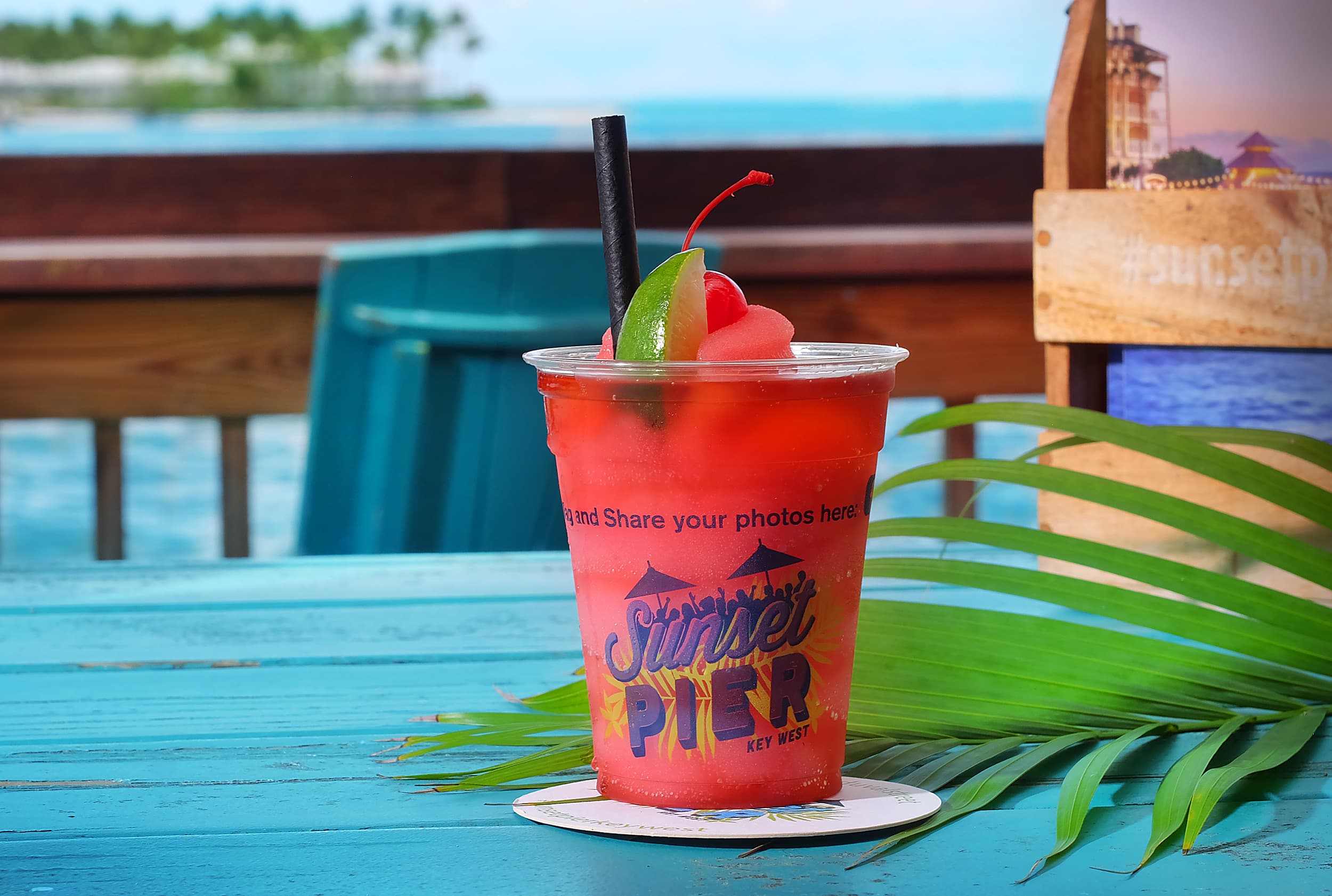 Frozen strawberry daiquiri with lime and cherry on Sunset Pier, Ocean Key Resort, Key West, Florida