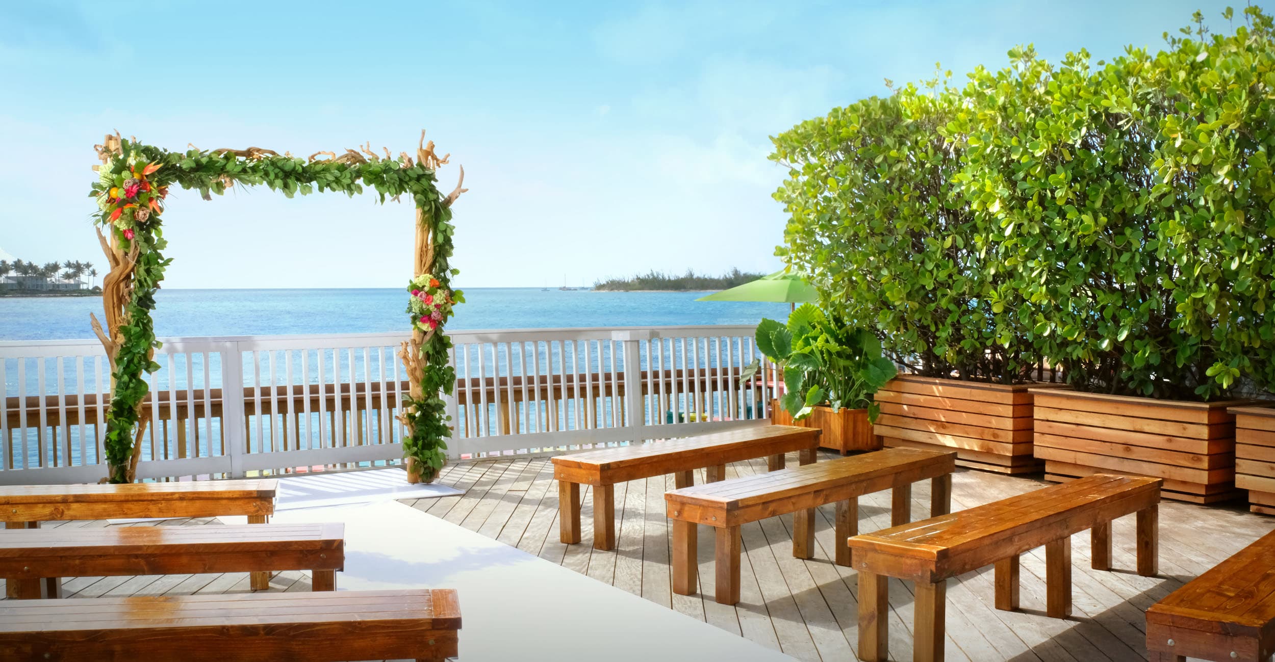 A wedding ceremony space set up for a wedding on the water