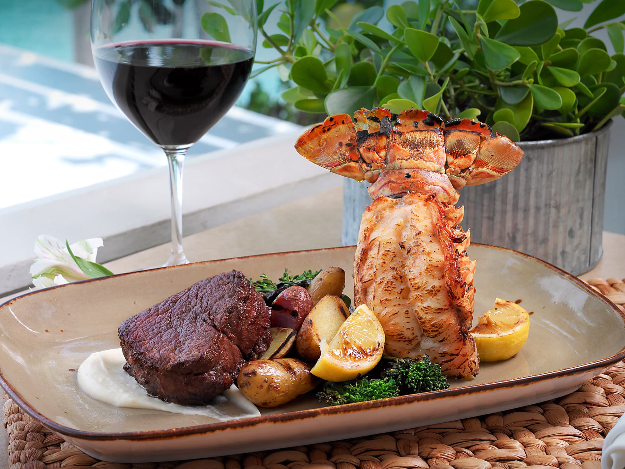 Grilled lobster tail and filet with red wine at Hot Tin Roof, Ocean Key Resort, Key West, Florida