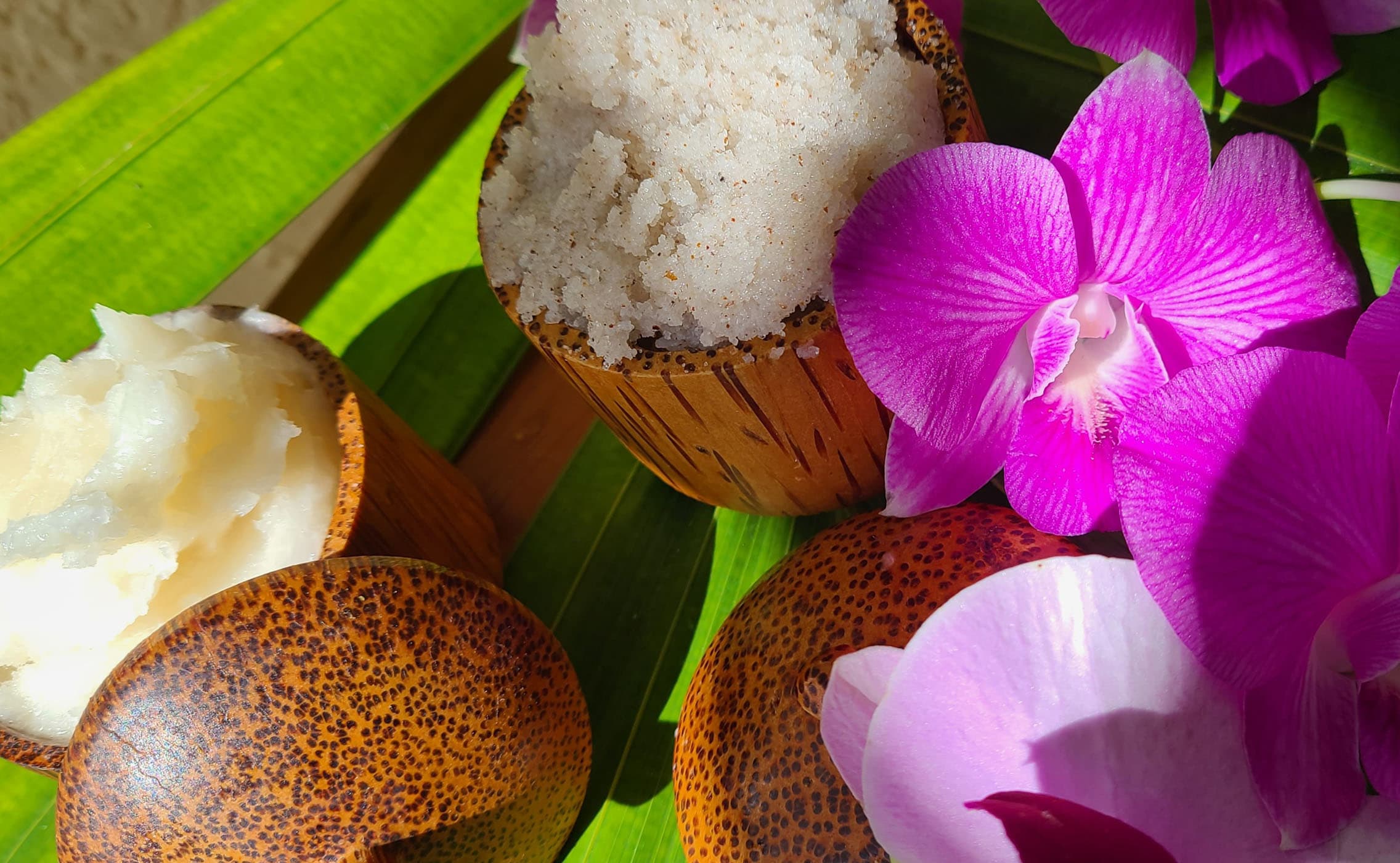 Purple and pink orchids with some wellness lotions