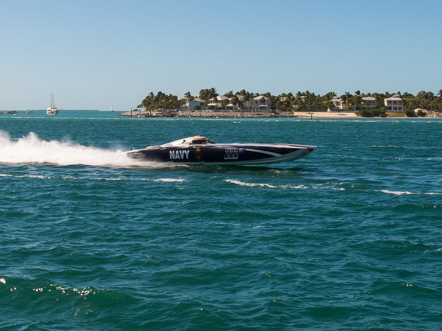 A boat during in the water World Offshore Key West Championships