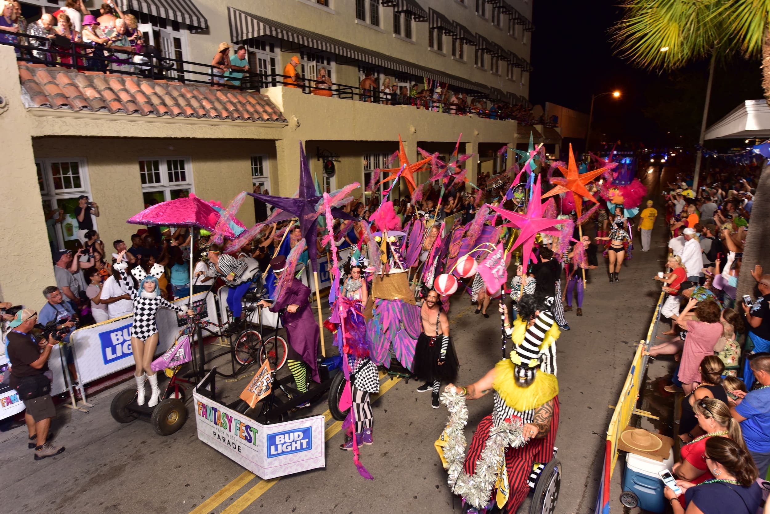 A bunch of people in the streets celebrating Fantasy Fest