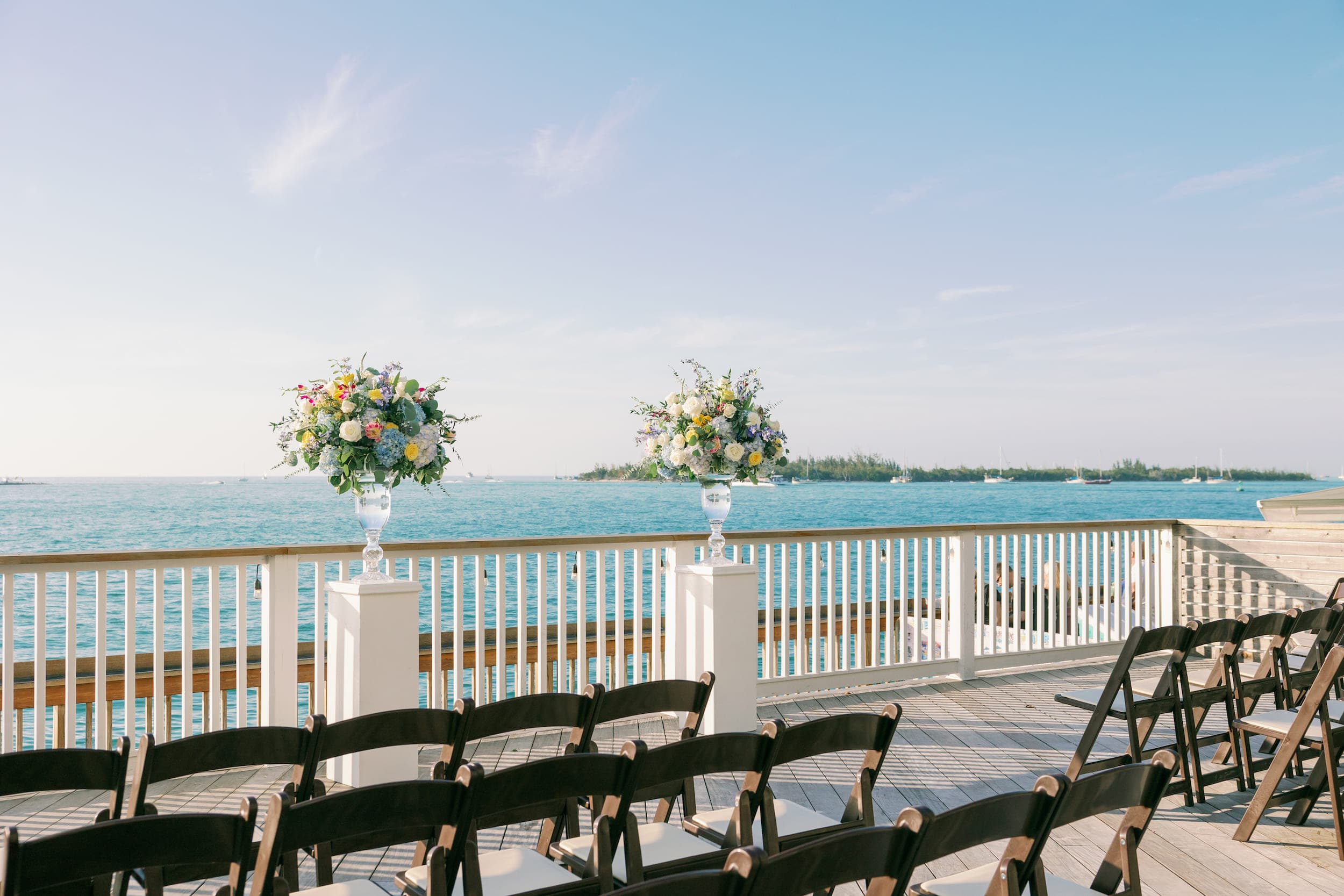 A wedding set up to over look the water on the pier