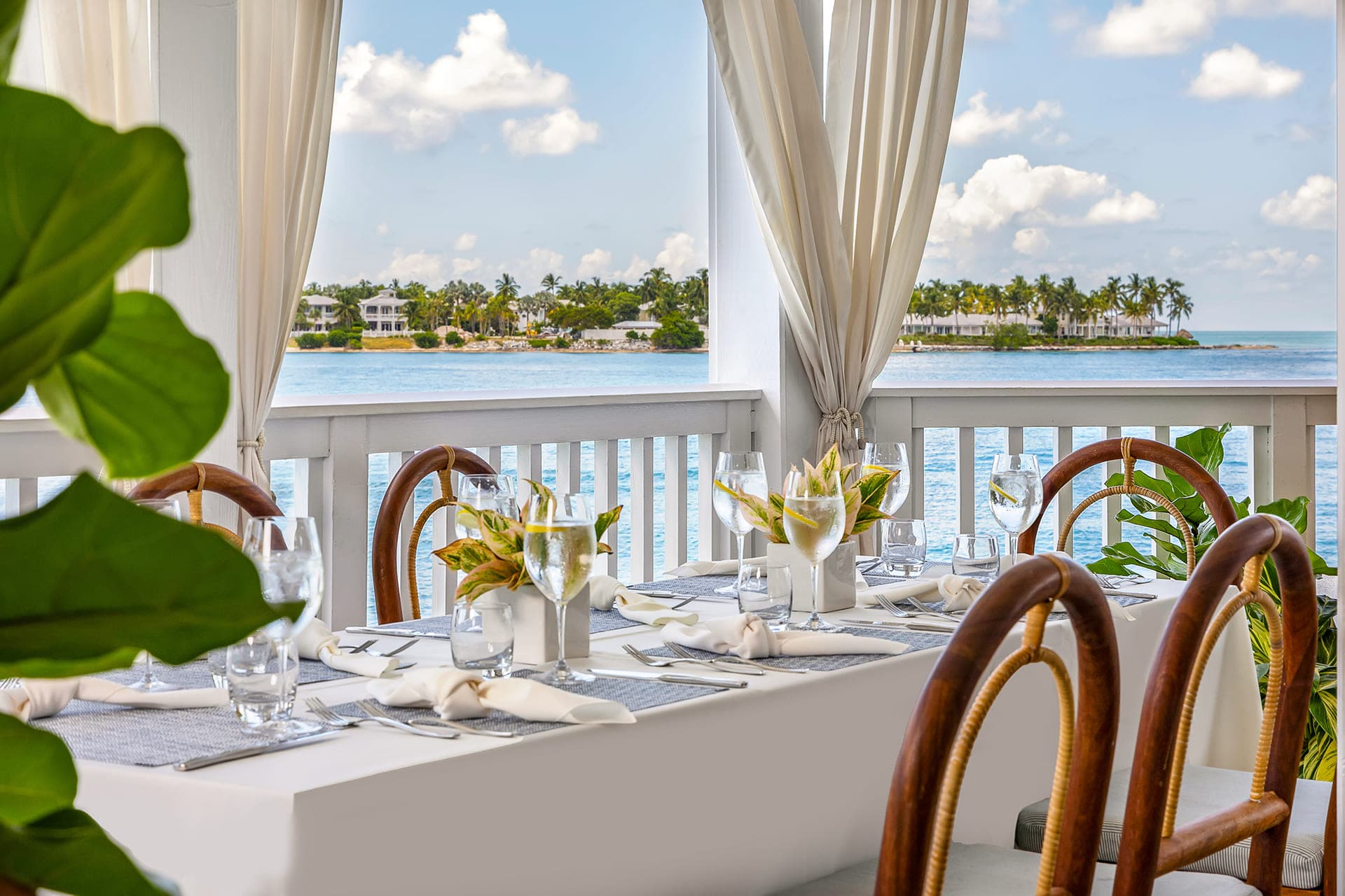 A table set up for a wedding over looking the water at OKR