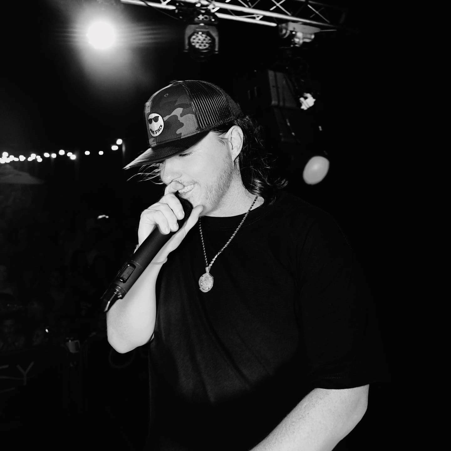 Mike Stack performing on stage at Sunset Pier, Ocean Key Resort in Key West, Florida