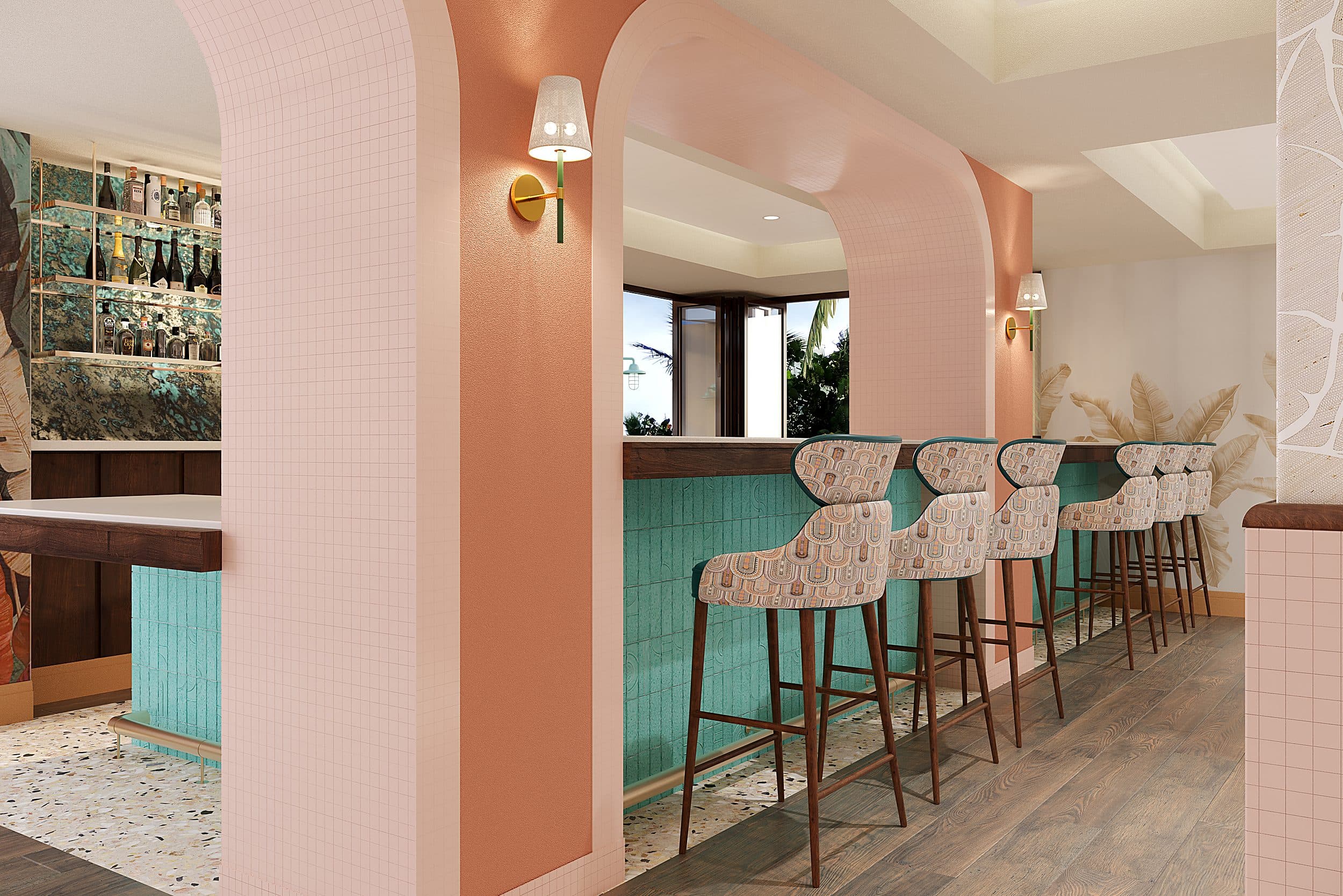 Tropical pink-and-teal lobby bar at Ocean Key Resort in Key West, Florida, featuring patterned barstools and a curated liquor display