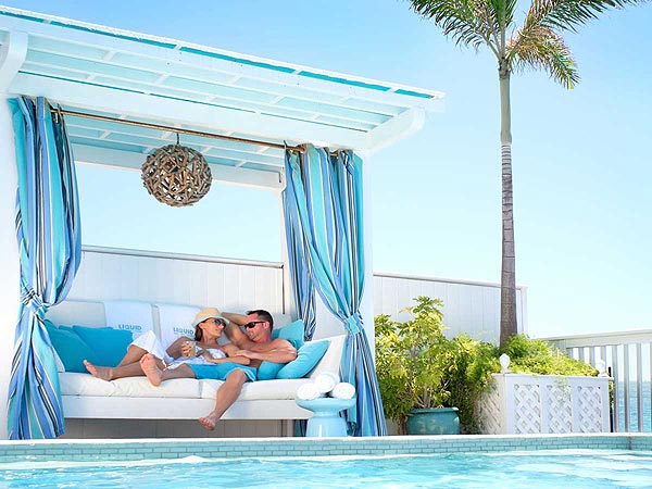 Couple in pool cabana at Ocean Key Resort