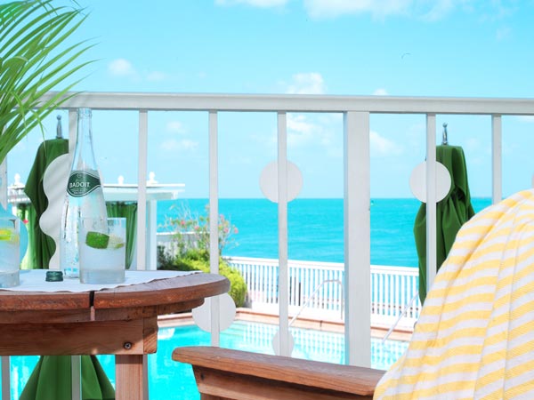 Balcony overlooking the pool and ocean.