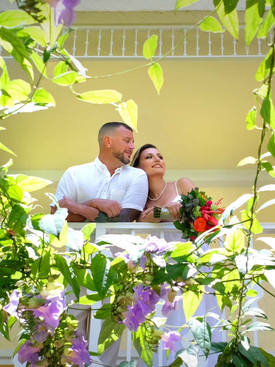 Bride And Groom On The Balcony At Ocean Key.