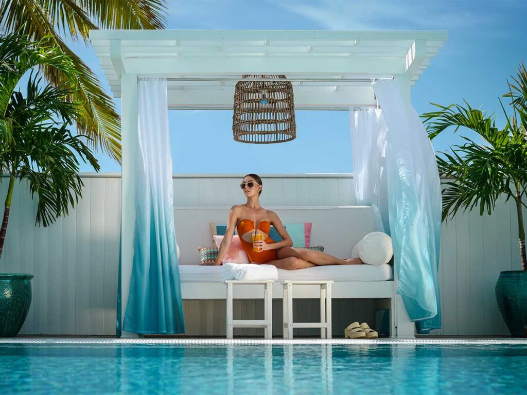 Lady Relaxing In A Cabana.