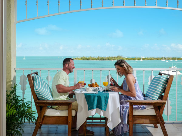 couple eating on penthouse balcony